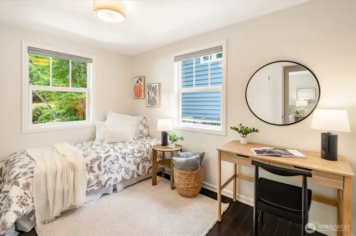 Spacious back bedrooms offer privacy and quiet.