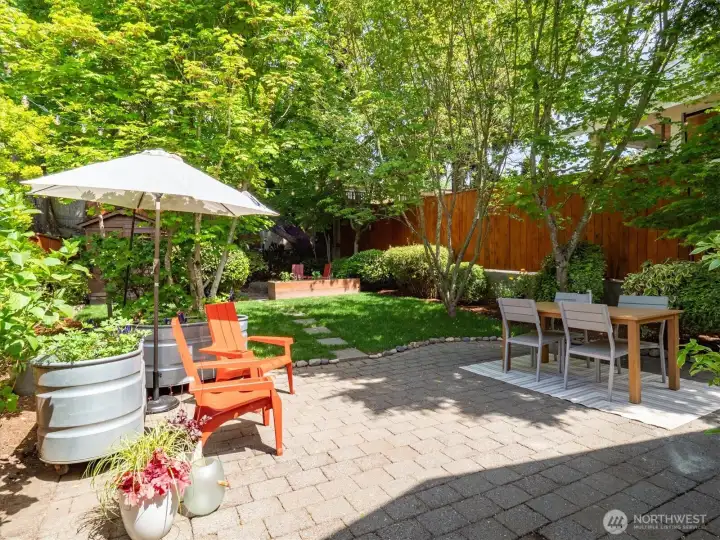 Sip morning coffee or afternoon cocktails in your backyard surrounded by beautiful gardens.