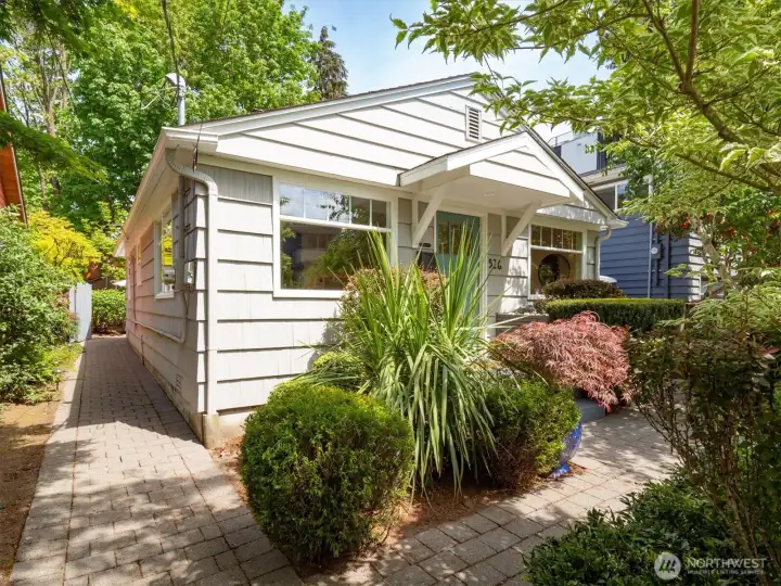 Home is surrounded by established, mature landscaping.