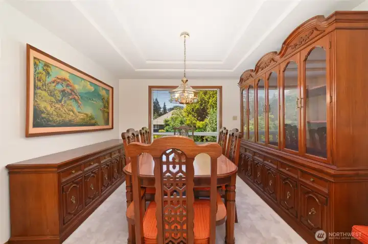 Formal dining area has coiffered ceiling Formal dining area has coiffered ceiling