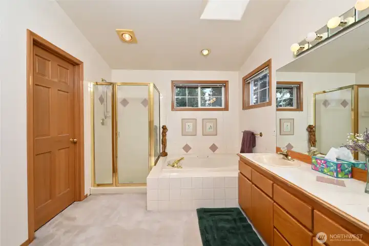 5-piece primary suite bath has a garden bathtub, separate shower, double vanity, walk-in closet and W/C 5-piece primary suite bath has a garden bathtub, separate shower, double vanity, walk-in closet and W/C