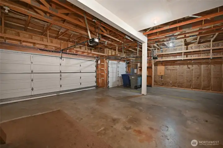3-bay garage has openers, good storage & workbench 3-bay garage has openers, good storage & workbench