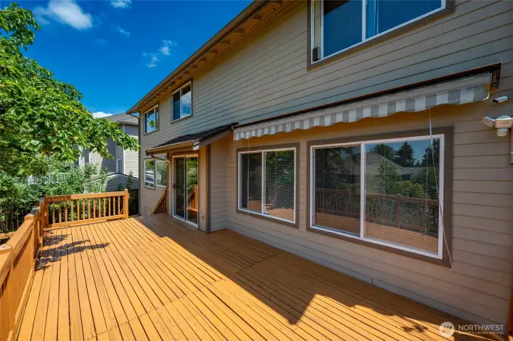 Upper deck has electric awning, slider access from kitchen Upper deck has electric awning, slider access from kitchen
