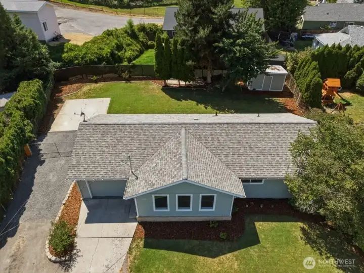 Quaint home on large lot with irrigation in great location.