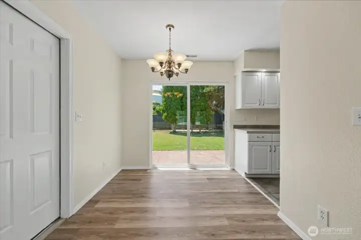 Eating space with sliding door access to backyard.