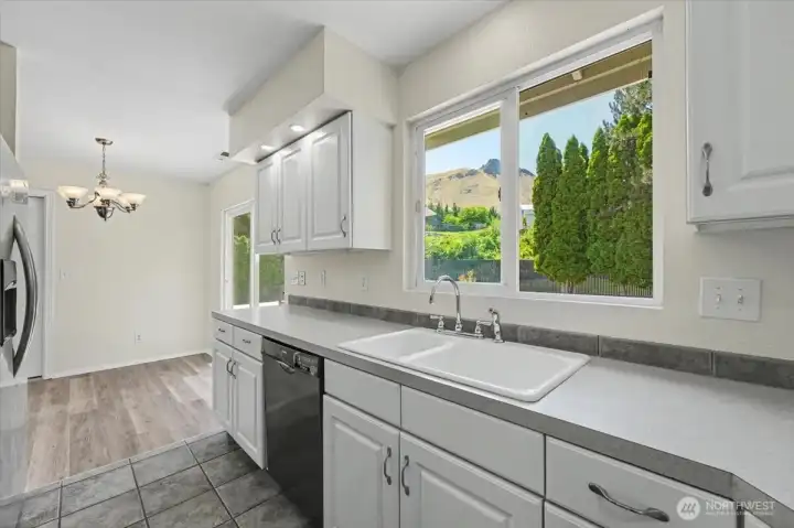 Easy flow from kitchen to backyard.