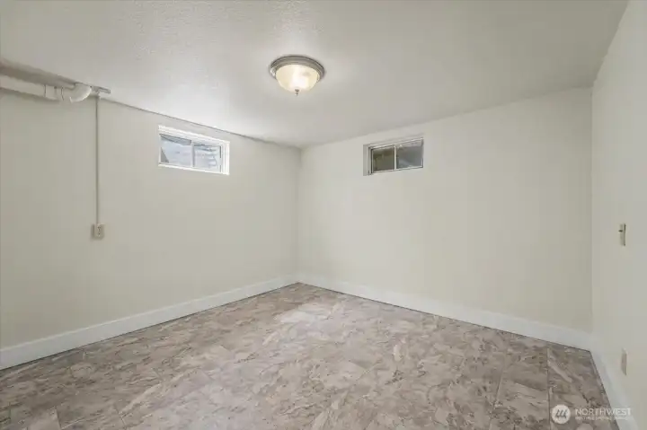 Third room in basement.
