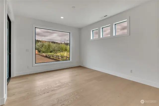 Kitchen nook looks outside to the designated wetland next door, this will remain natural