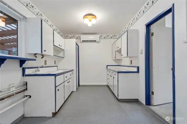 Extra large utility/mud room with an abundance of storage and ADA potential!