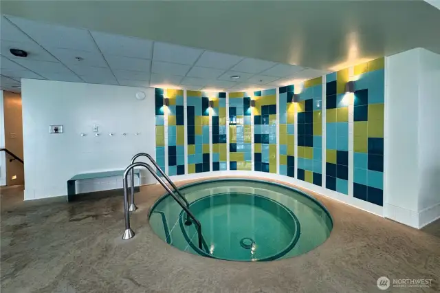 Jetted spa to soak & relax just off the pool.