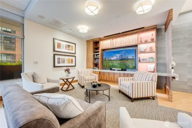 Club room has a flat screen TV, pool table and full kitchen to cater events.