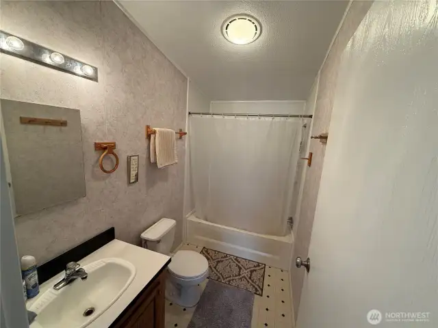 Main Bathroom with room to make a bigger vanity or add shelving