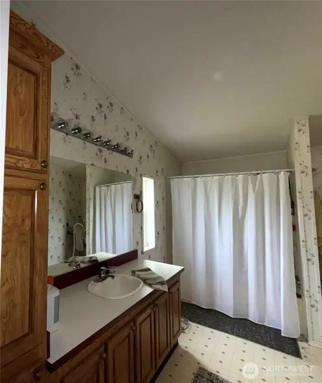 Primary Ensuite with tons of cabinets and counter space