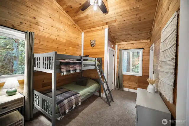 1st bedroom on the 3rd floor with a bunk. The home is being sold fully-furnished.