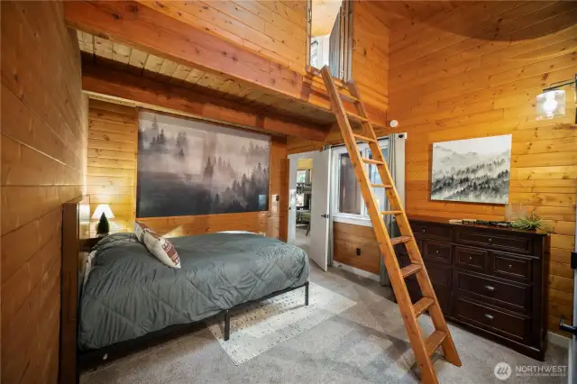 Primary bedroom on the 3rd floor. Two of the bedrooms on the 3rd floor have access to the "eagle's nest" loft, and each of the two has its own full ensuite bathroom.