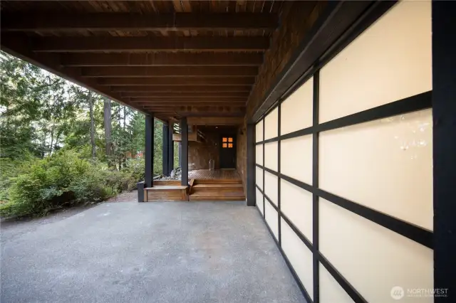 Large attached garage, currently set up as a game room.