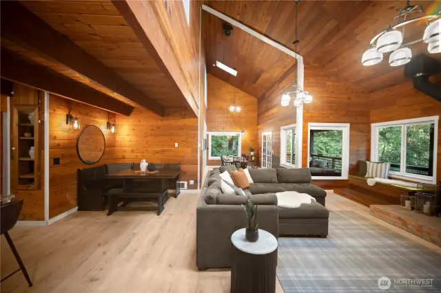 Entertain with an open Great Room concept that flows right out onto the deck that feels like you're in a treehouse. Or gather around the warm wood stove at night.