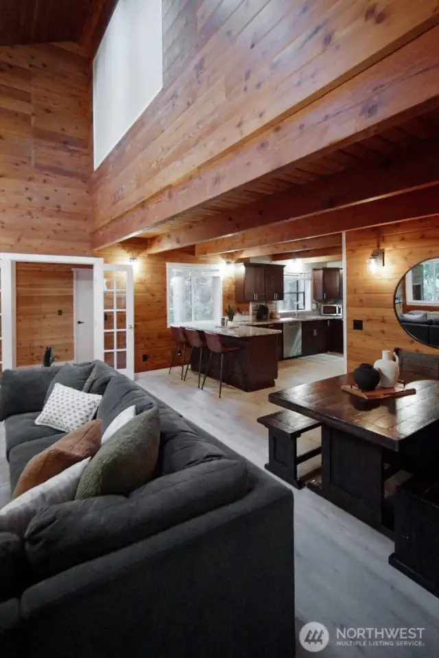 Vaulted ceilings and large windows help to let in the light and draw out those warm wood tones.