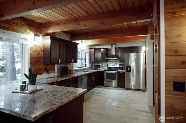 Modern, upgraded kitchen makes preparing and serving meals simple and enjoyable.