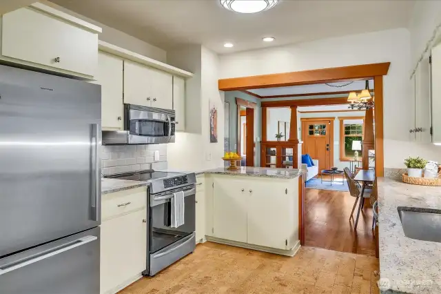 The spacious kitchen is a chef's delight...this is the view into the dining room and living room.