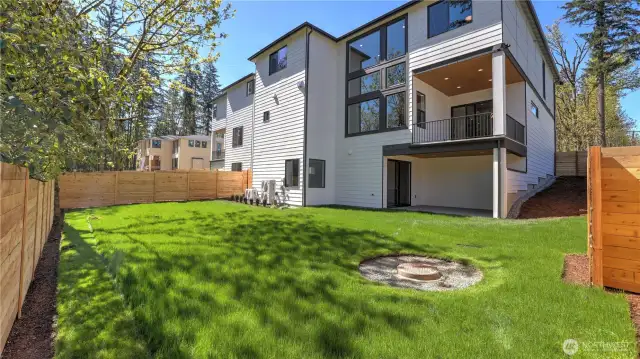 Large and level backyard offers countless possibilities!