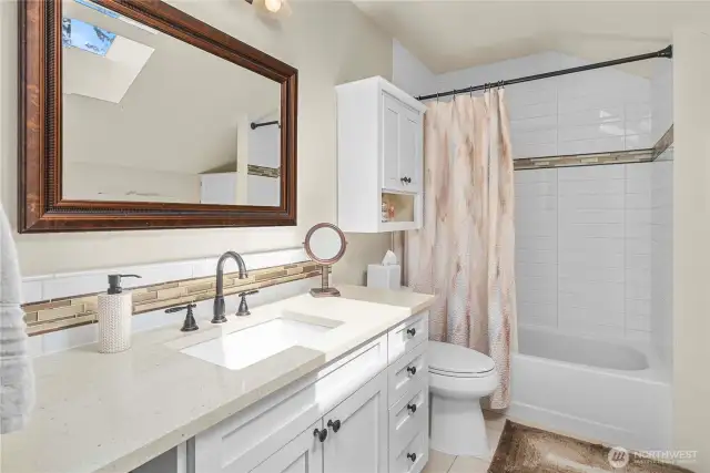 Upstairs full bathroom with lots of storage