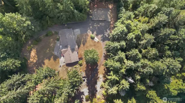 Talk about secluded yet close to shopping, restaurants, and more. This unique and rare property has it all!