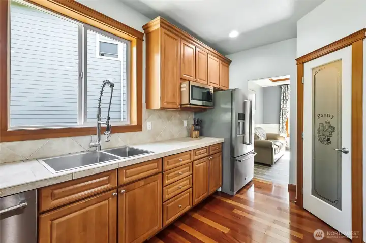 The Walk-in pantry is conveniently located, along with access to the Living Room.