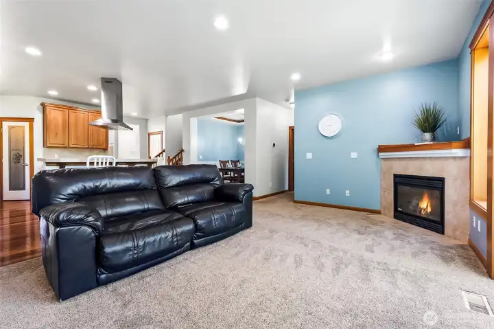 This Family Room is a fantastic gathering space with access to the 3/4 Bath & Den.