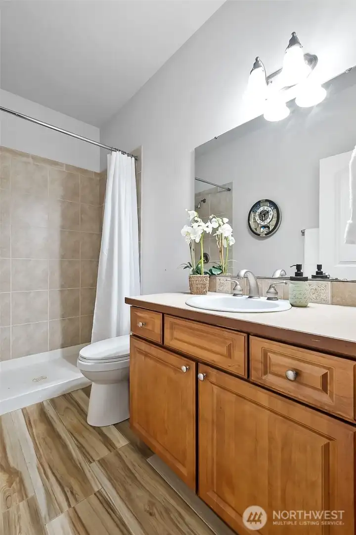 This 3/4 Bath on the Main is conveniently located next to the Den, off the Family Room.