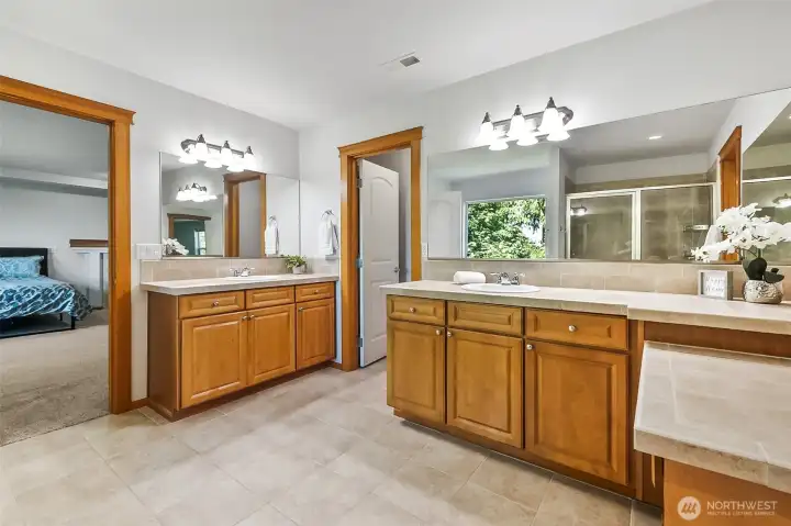 You will love this spacious Primary Bath with raised His & Her vanities.