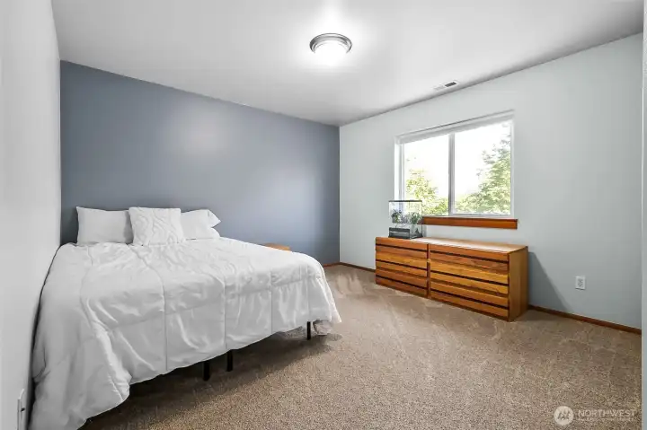 Bedroom #2 is spacious & has a peek-a-boo view of Mt. Rainier.