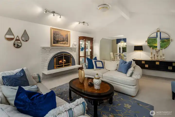The living room seamlessly connects to the dining area and kitchen, offering an open, airy layout ideal for both everyday living and hosting. Thoughtful details and designer finishes complement the home’s inviting Northwest aesthetic.