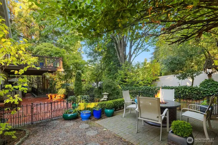 The yard and adjacent properties trees accentuate the beauty of this home.