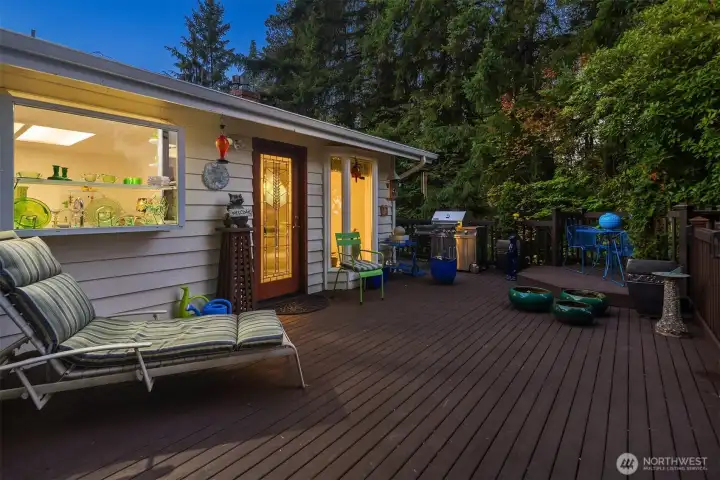 Easily accessible from the kitchen and dining area, this deck invites indoor-outdoor living. Perfect for grilling, evening gatherings, or enjoying your morning coffee among the trees.
