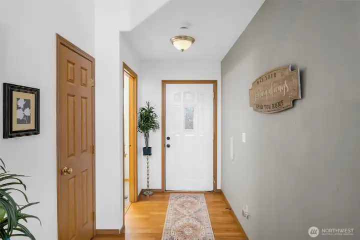 Entry Hall way, powder room and coat closet.