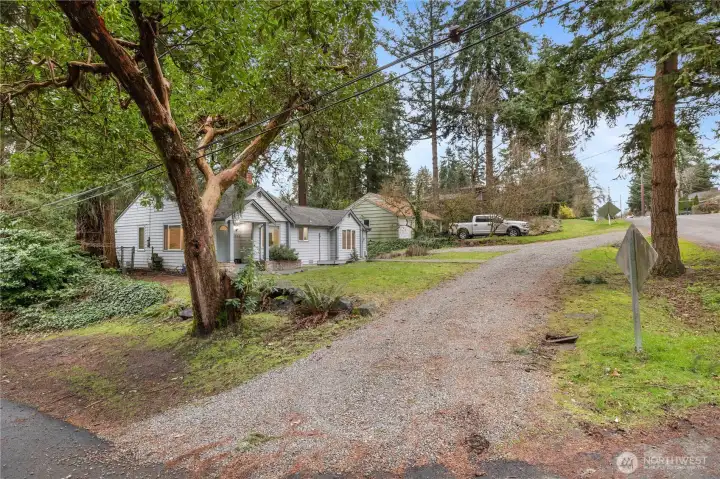 Circular driveway with even more parking on the side