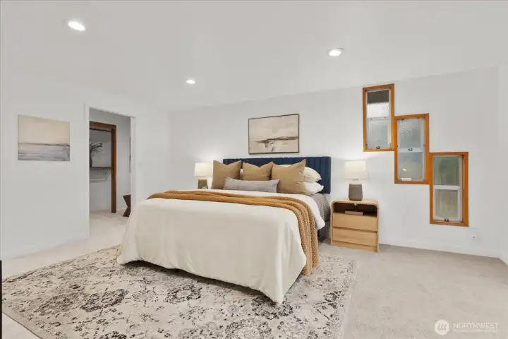 Primary bedroom with walk in closet