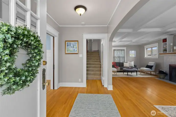 Upon entering the home, you are greeted with the boxed beam ceiling.