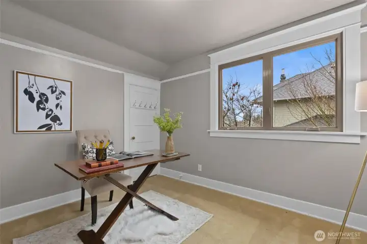 The bedroom closest to the bathroom.