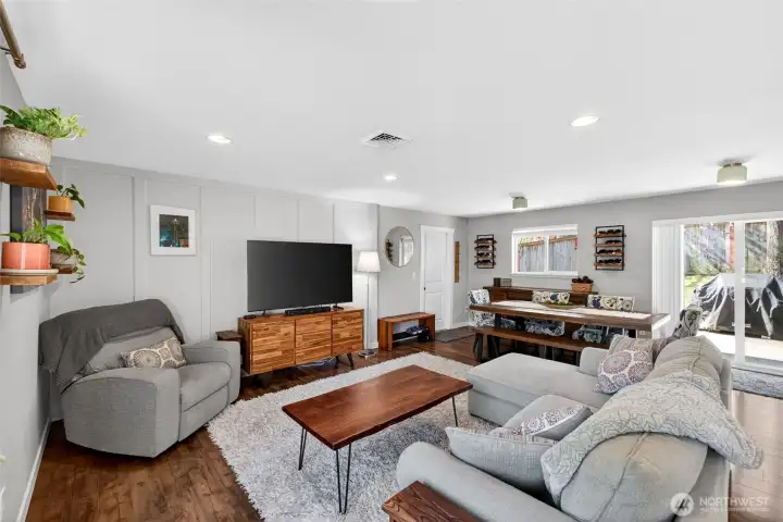 Open floor plan for living, dining & kitchen