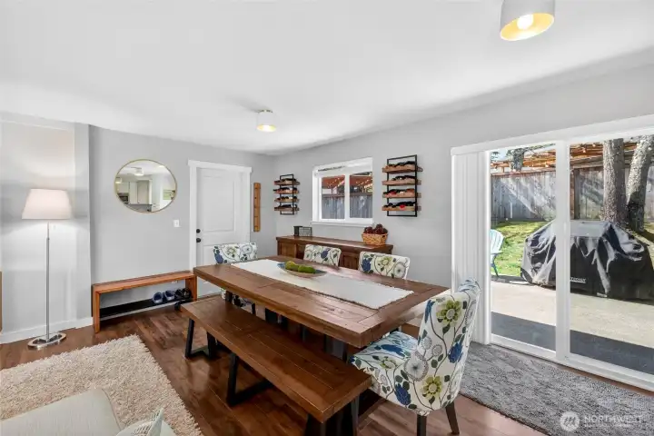 Slider to fenced backyard off of kitchen & dining area