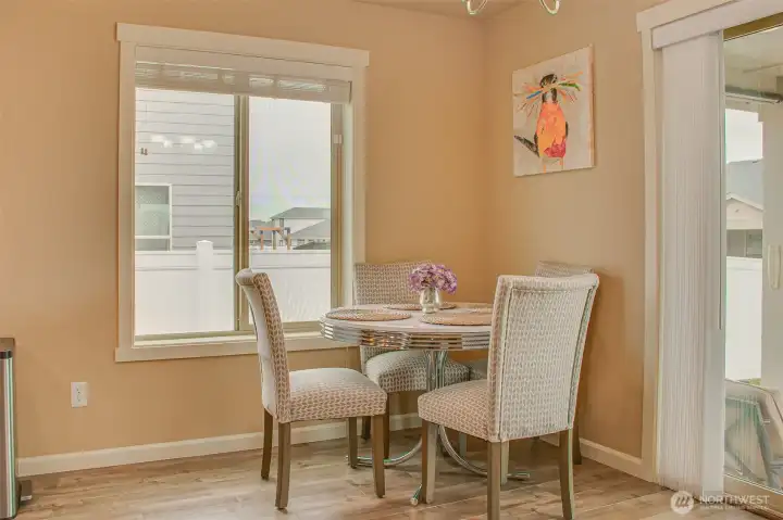 DINING SPACE: Kitchen to the Left, Backyard Entry to the Right