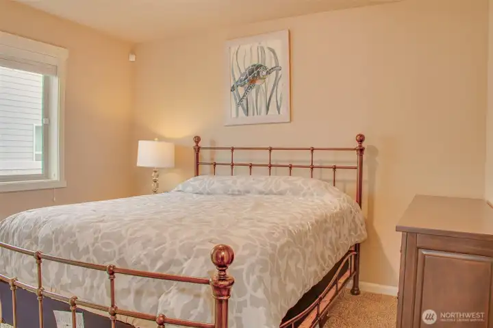 SECOND BEDROOM (from bedroom door): Carpeted, East-Facing Window with 2" Horizontal Vinyl Blinds; Comfortably Fits Queen-Size Bed and Furniture