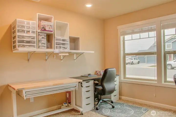 THIRD BEDROOM (from closet): Carpeted Flooring; Two North-Facing Street-View Windows with 2" Horizontal Vinyl Blinds.