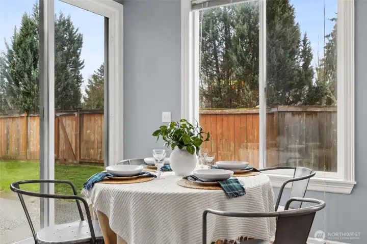 Eat-in kitchen with large windows