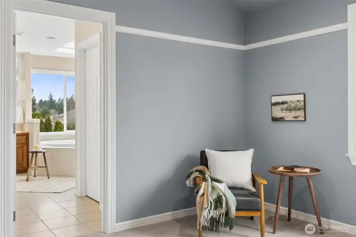 Primary sitting area opens to 5-piece bath