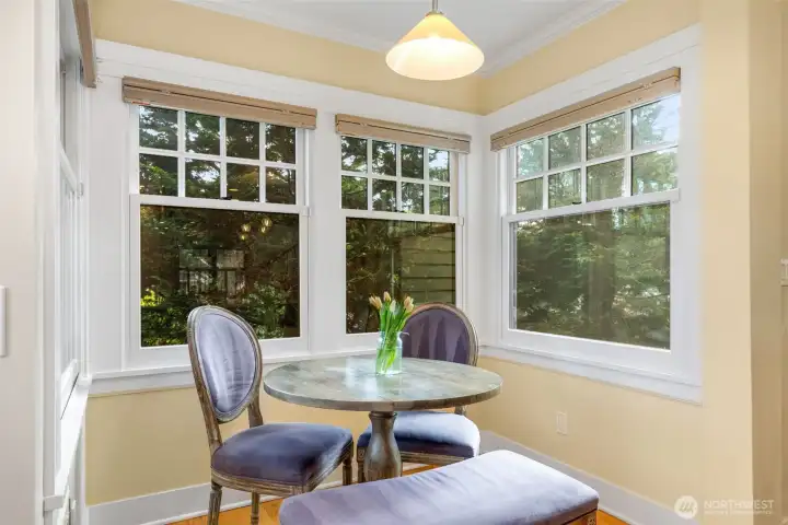 Sunny, light-filled breakfast nook—perfect for easy mornings and casual dining.