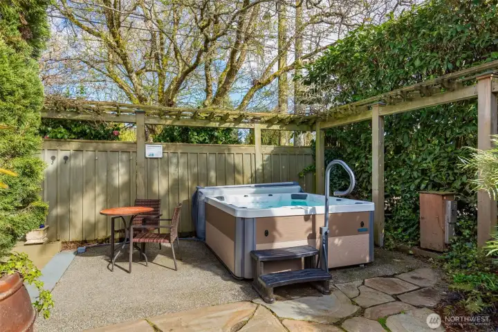 Relax in the hot tub after a long day! Conveys with house.