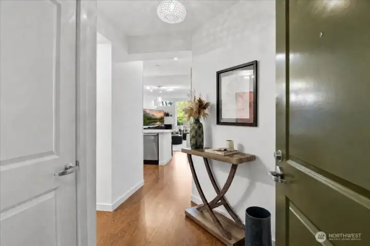 Enter the home into a true 'Foyer'. Recently updated wood floors and freshly painted walls throughout this home.